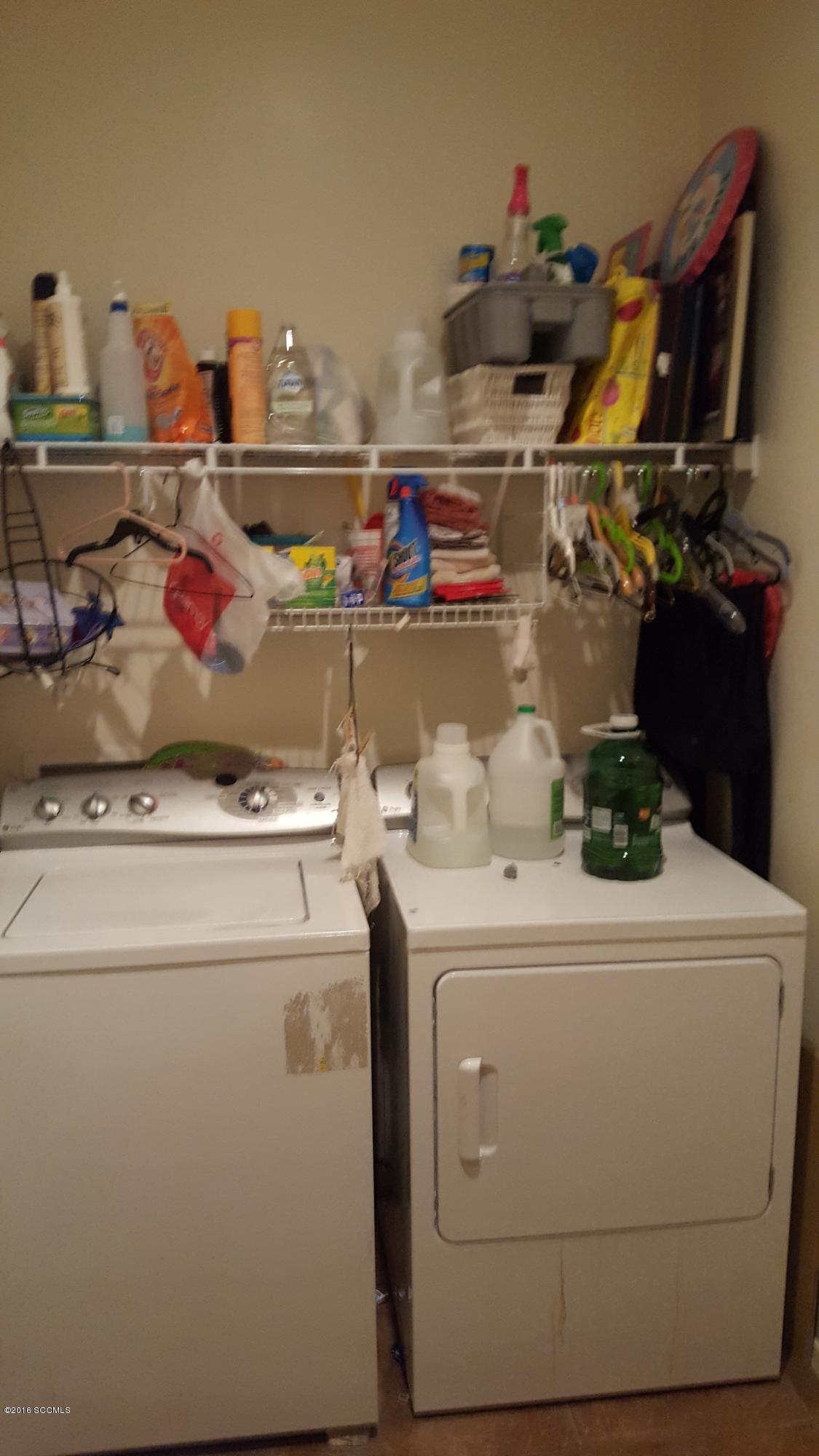 304 Circulo Bellagio Rio Rico, AZ 85648 - Photo 13 of 19 a utility room with dryer and washer
