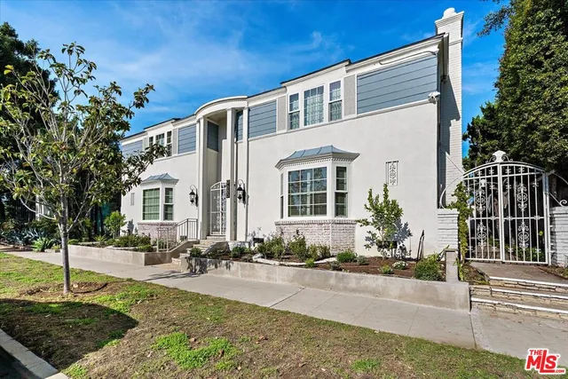 a front view of a house with entertaining space