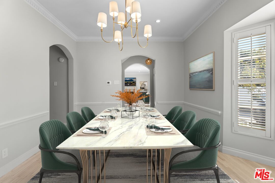 9683 West Olympic Boulevard Beverly Hills, CA 90212 - Photo 4 of 20 a view of a dining room with furniture window and outside view