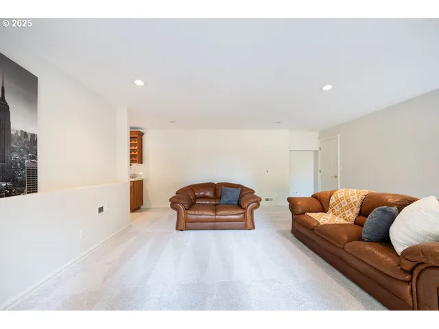 a living room with furniture and a couch