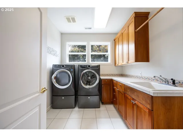a view of a backyard with sitting area