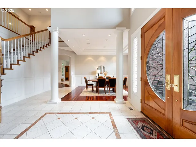 a view of a living room with a large window