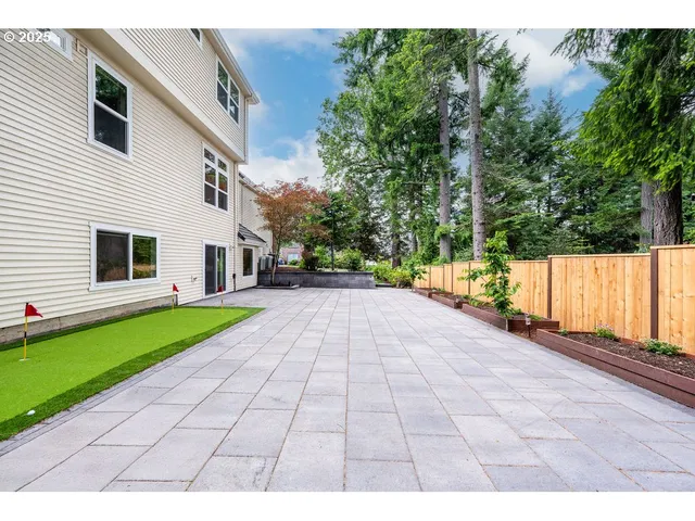 a view of a chairs and table in the balcony
