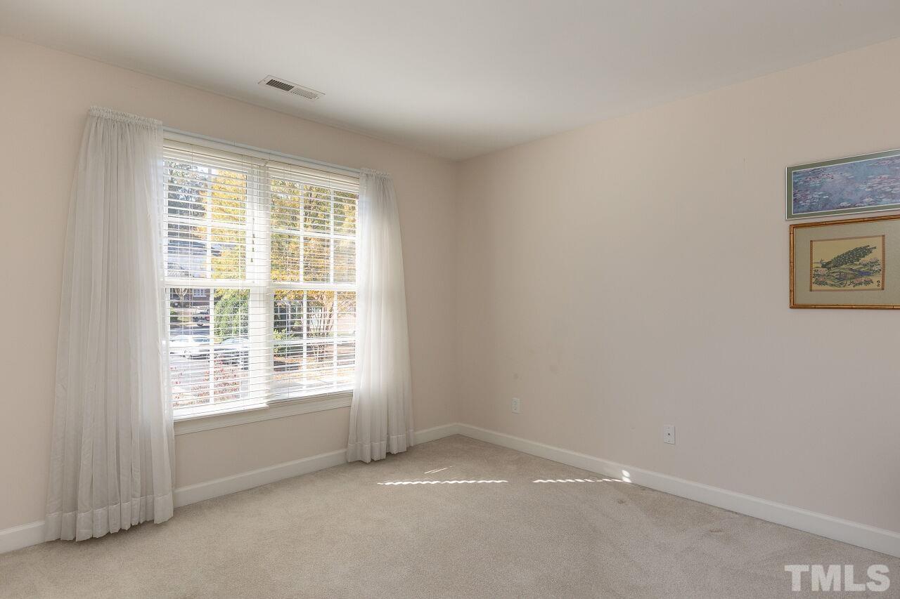 7382 Fontana Ridge Lane Raleigh, NC 27613 - Photo 19 of 30 a view of an empty room with a window