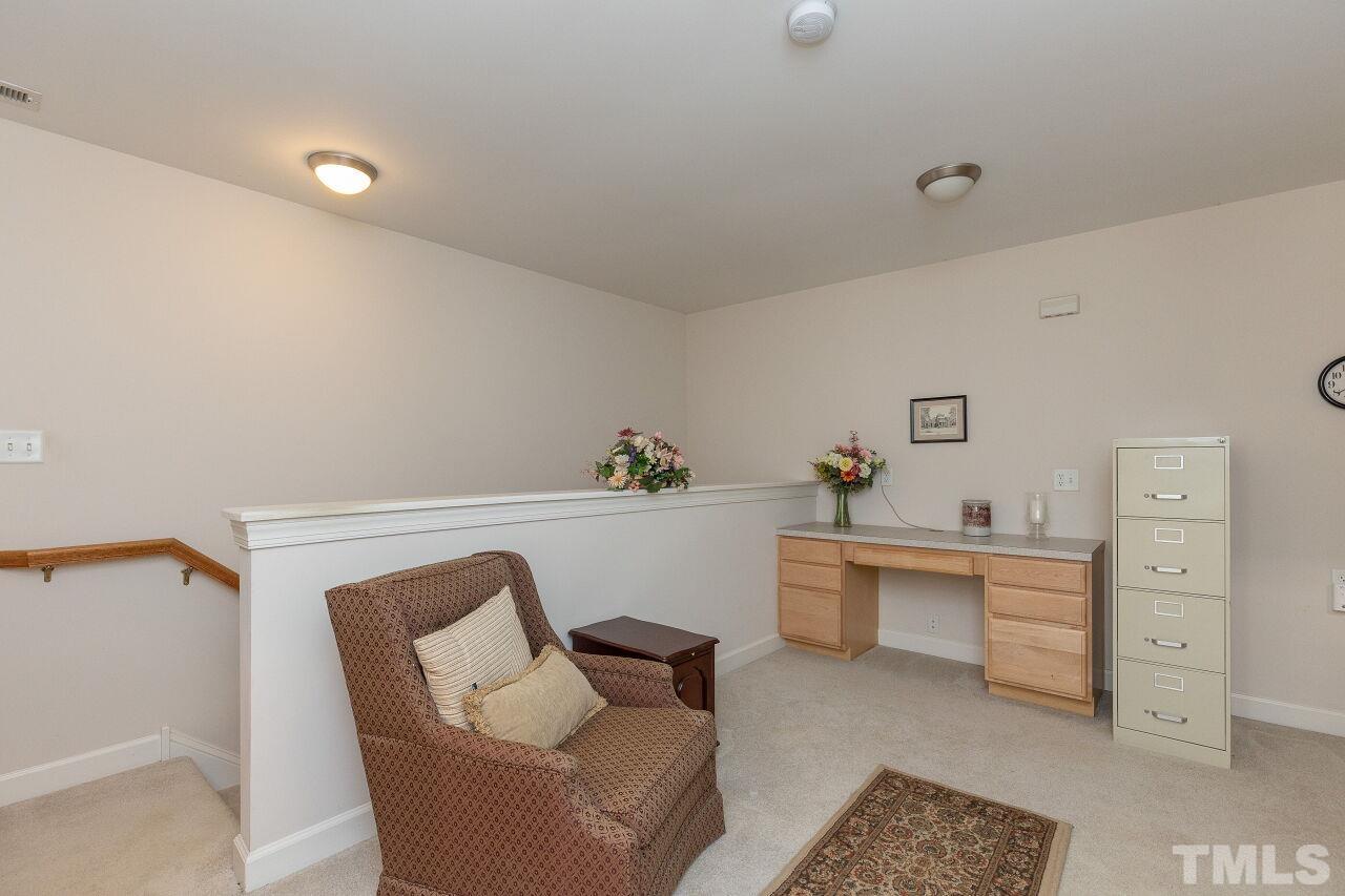 7382 Fontana Ridge Lane Raleigh, NC 27613 - Photo 22 of 30 a workspace with furniture and window