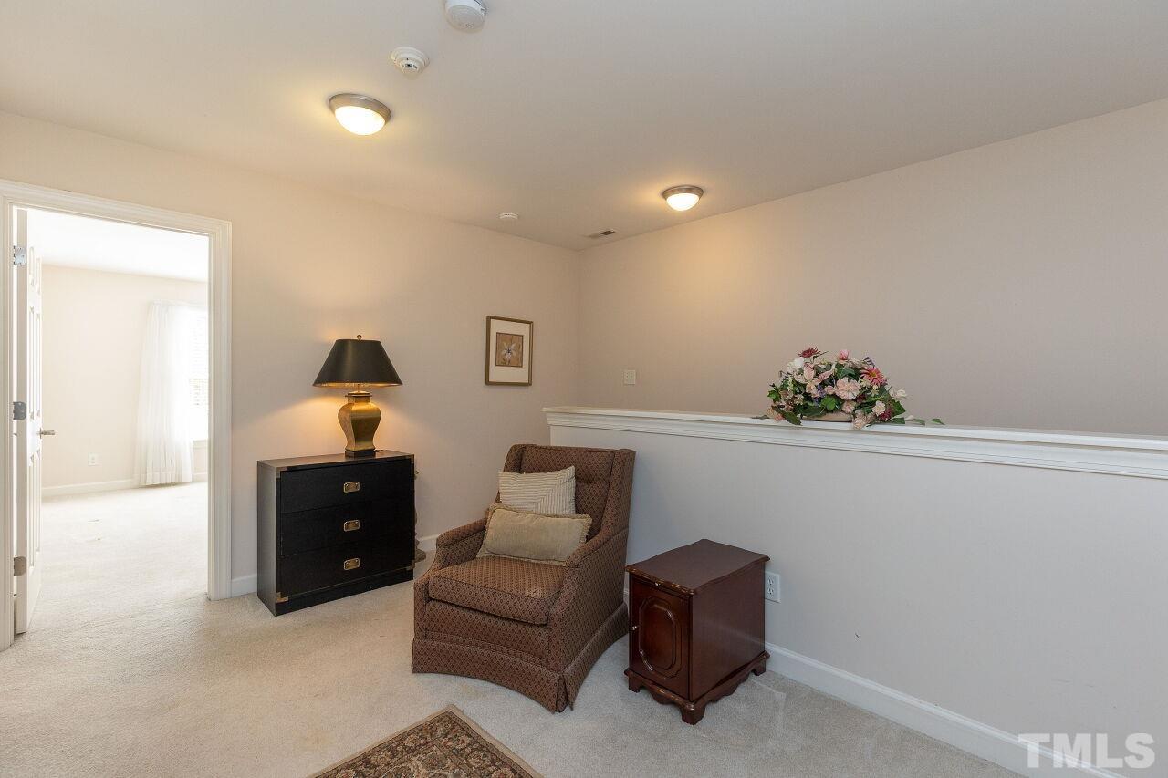 7382 Fontana Ridge Lane Raleigh, NC 27613 - Photo 23 of 30 a living room with furniture and a couch