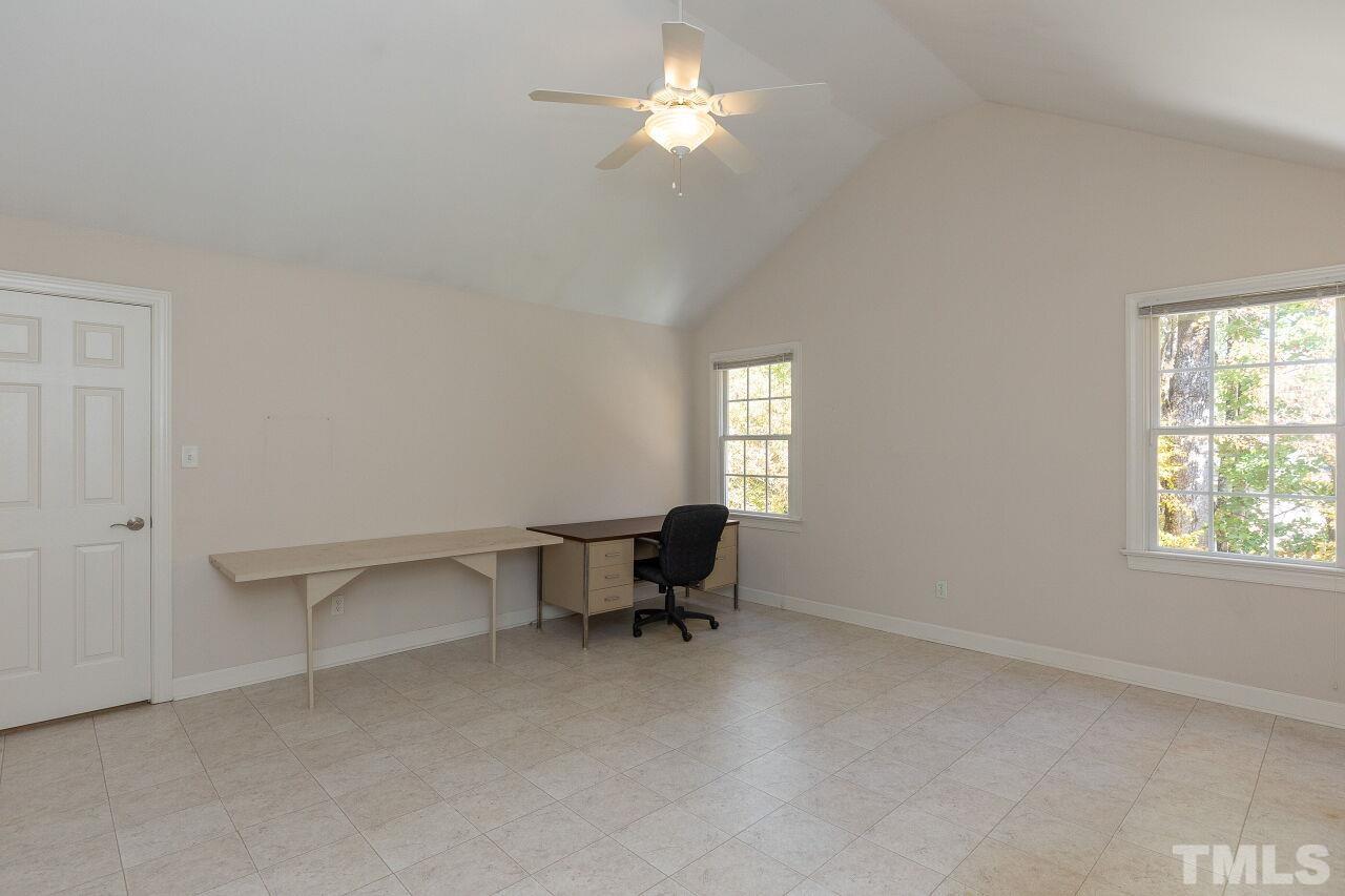 7382 Fontana Ridge Lane Raleigh, NC 27613 - Photo 25 of 30 a living room with furniture and a window