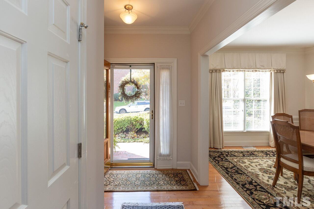 7382 Fontana Ridge Lane Raleigh, NC 27613 - Photo 5 of 30 a view of a livingroom with wooden floor and a window