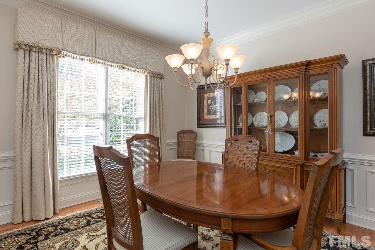 7382 Fontana Ridge Lane Raleigh, NC 27613 - Photo 6 of 30 a view of a dining room with furniture window and outside view