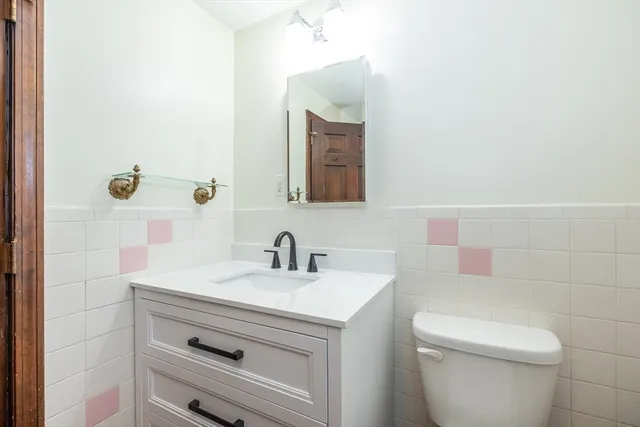 a bathroom with a sink and a toilet