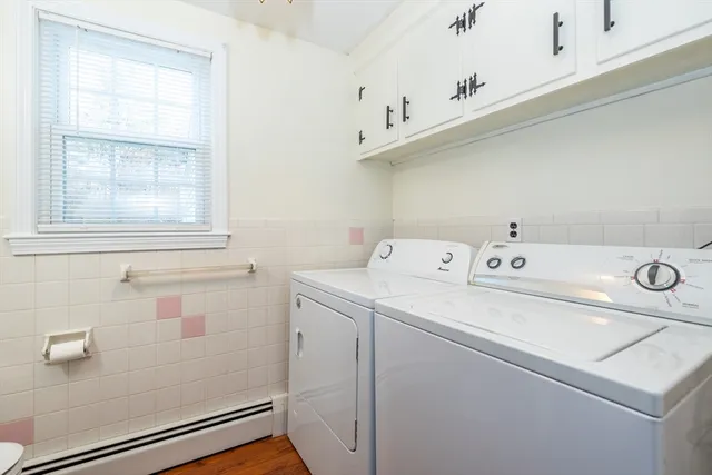 a utility room with dryer and washer