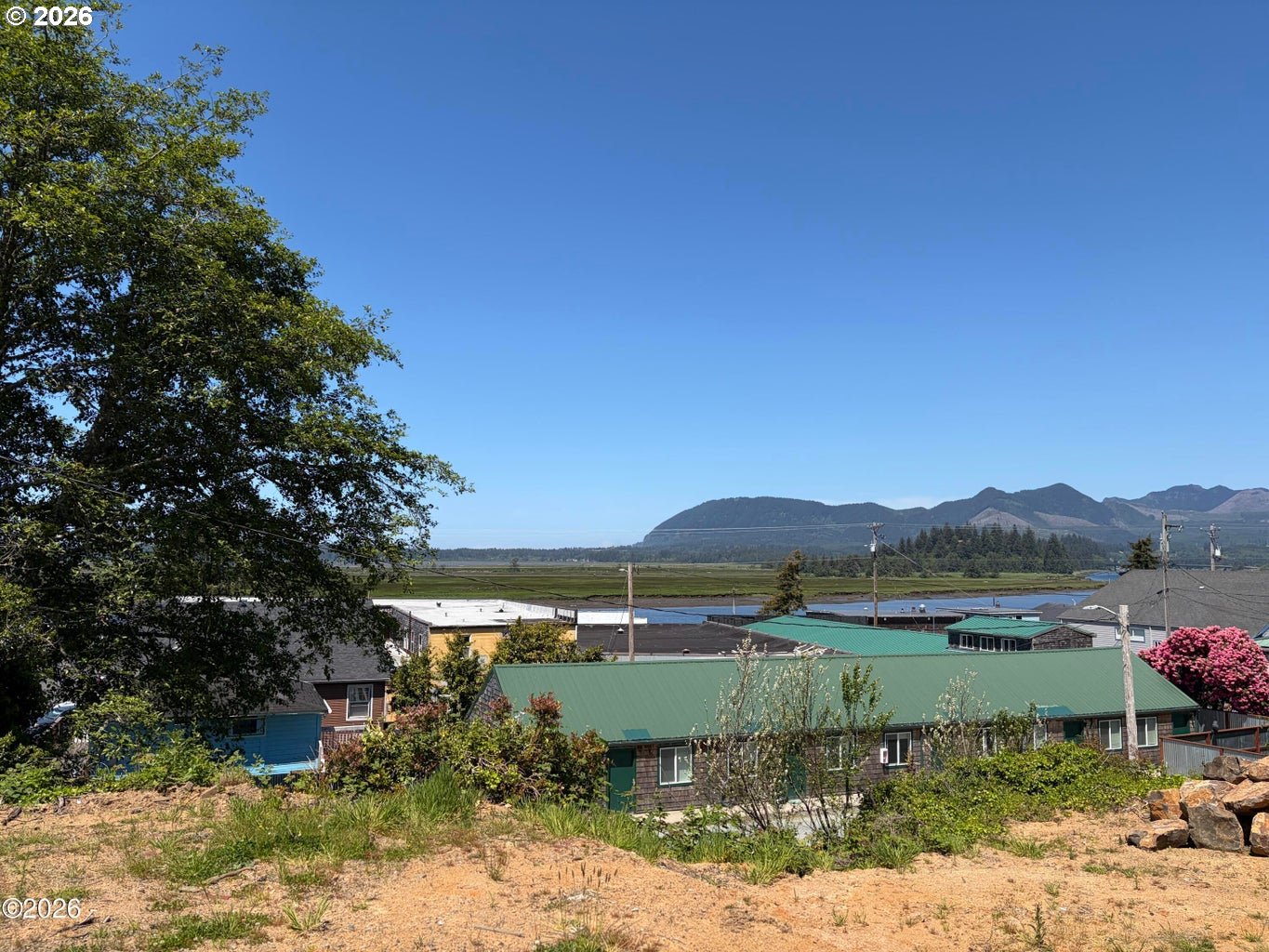 95 Gregory Street Wheeler, OR 97147 - Photo 3 of 20 a view of lake with mountain