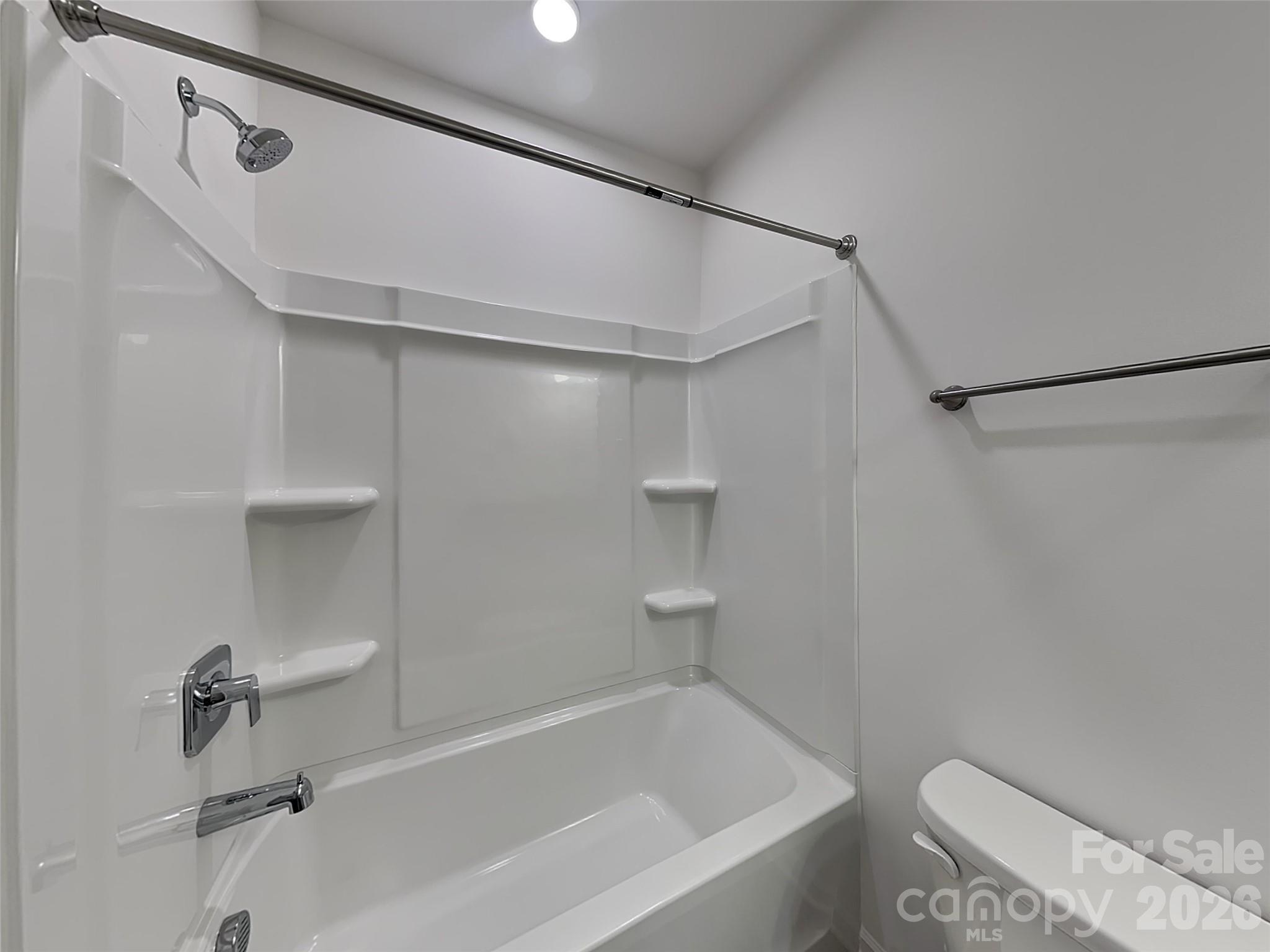 481 Hager Lake Road Mooresville, NC 28115 - Photo 17 of 23 a bathroom with a bathtub and a shower