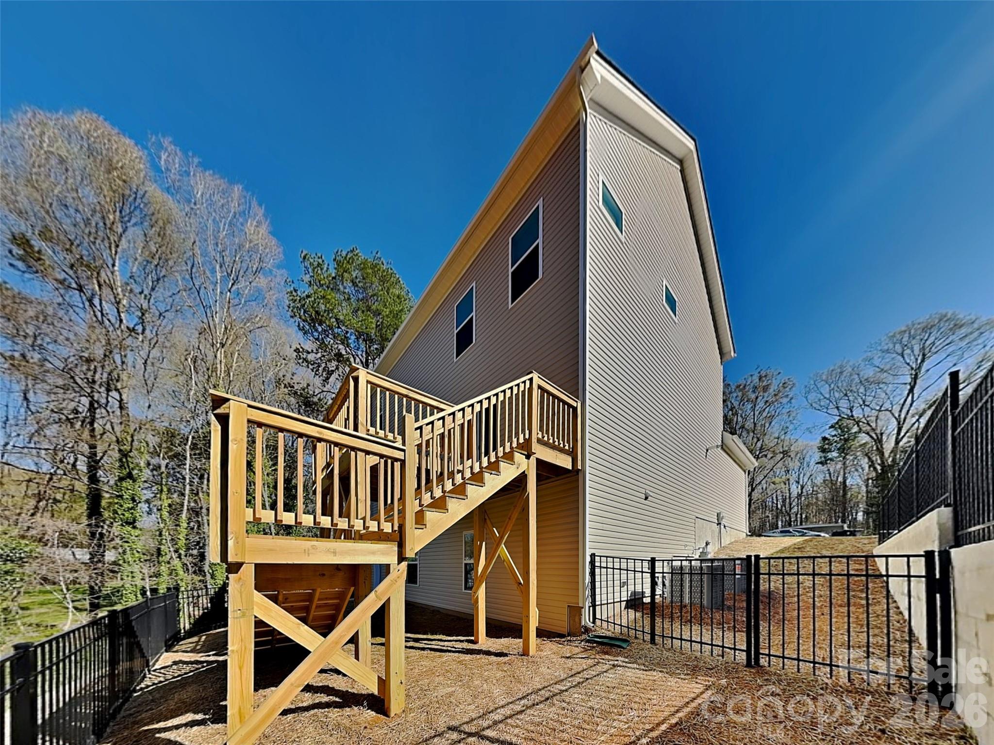 481 Hager Lake Road Mooresville, NC 28115 - Photo 20 of 23 a view of a house with backyard and deck