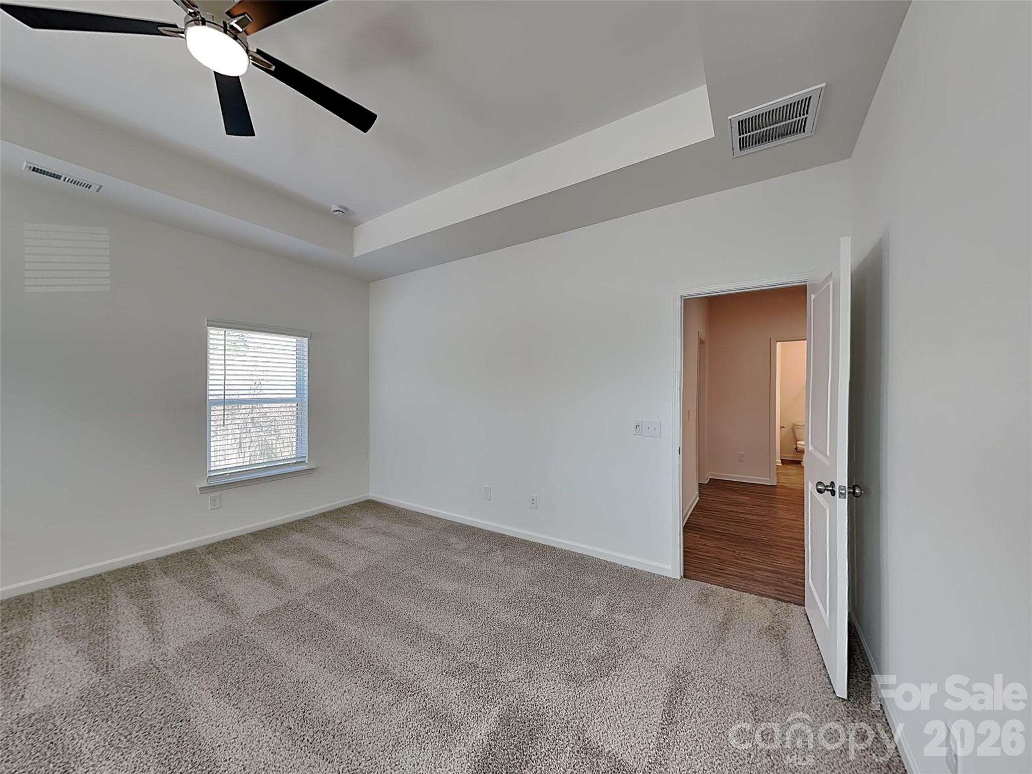 481 Hager Lake Road Mooresville, NC 28115 - Photo 10 of 23 a view of an empty room and window
