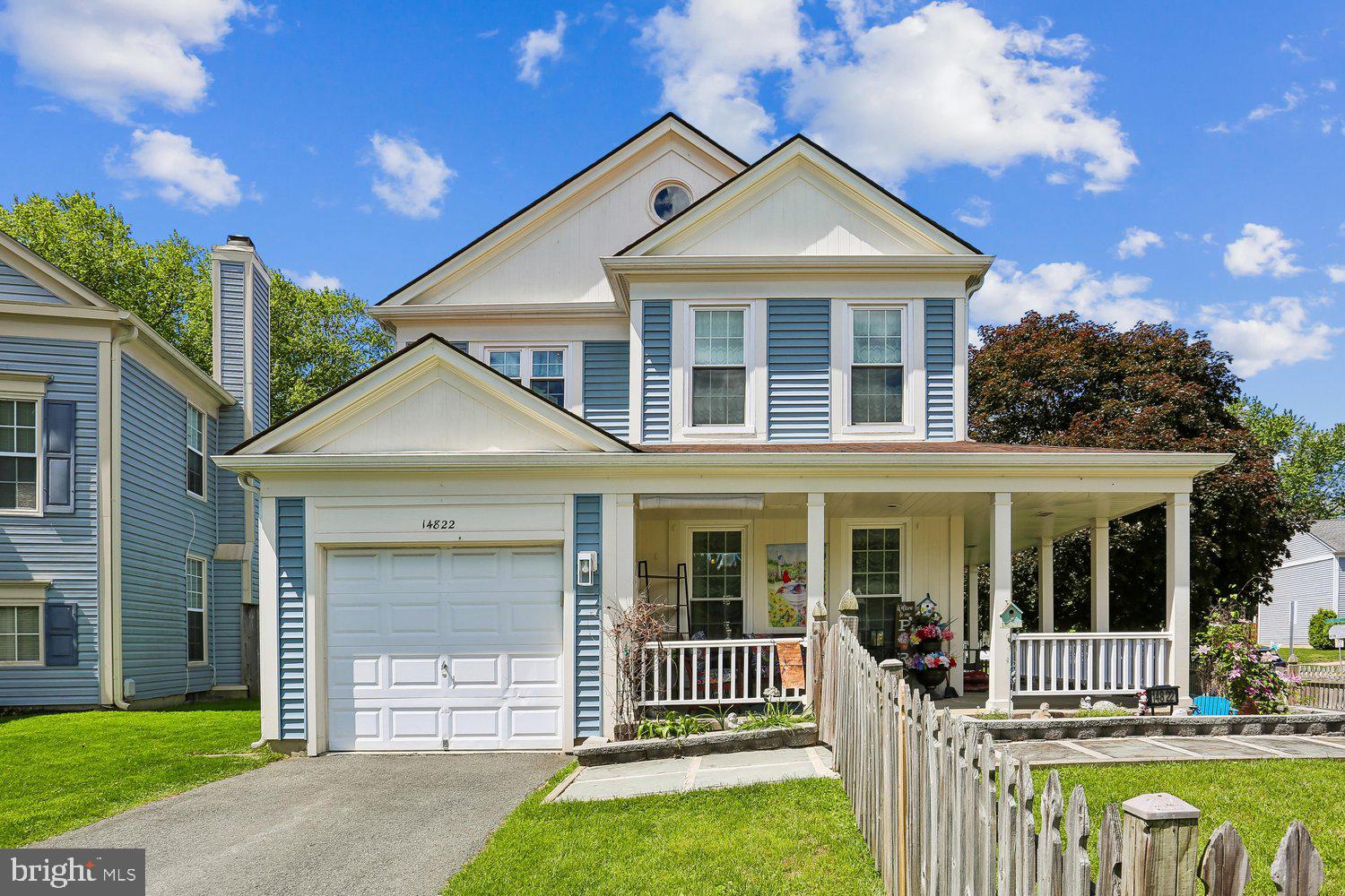 14822 Rose Trellis Place Silver Spring, MD 20906 - Photo 1 of 65 front view of a house with a yard
