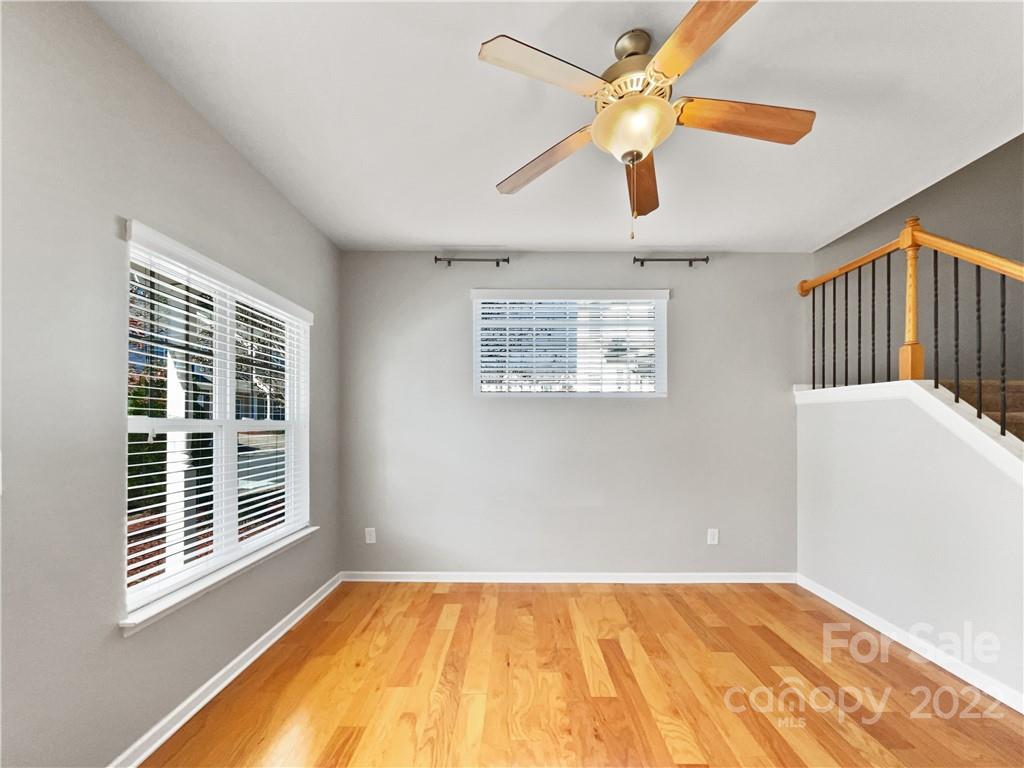 1417 Harpers Inlet Drive Clover, SC 29710 - Photo 6 of 20 a view of an empty room with window and a chandelier fan