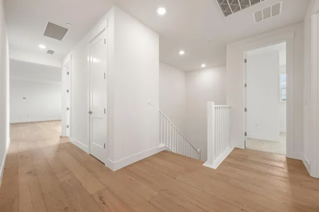 a view of entryway with wooden floor
