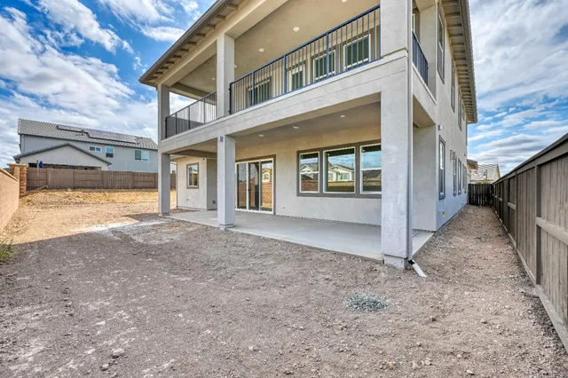 a view of a house with a snow in the yard