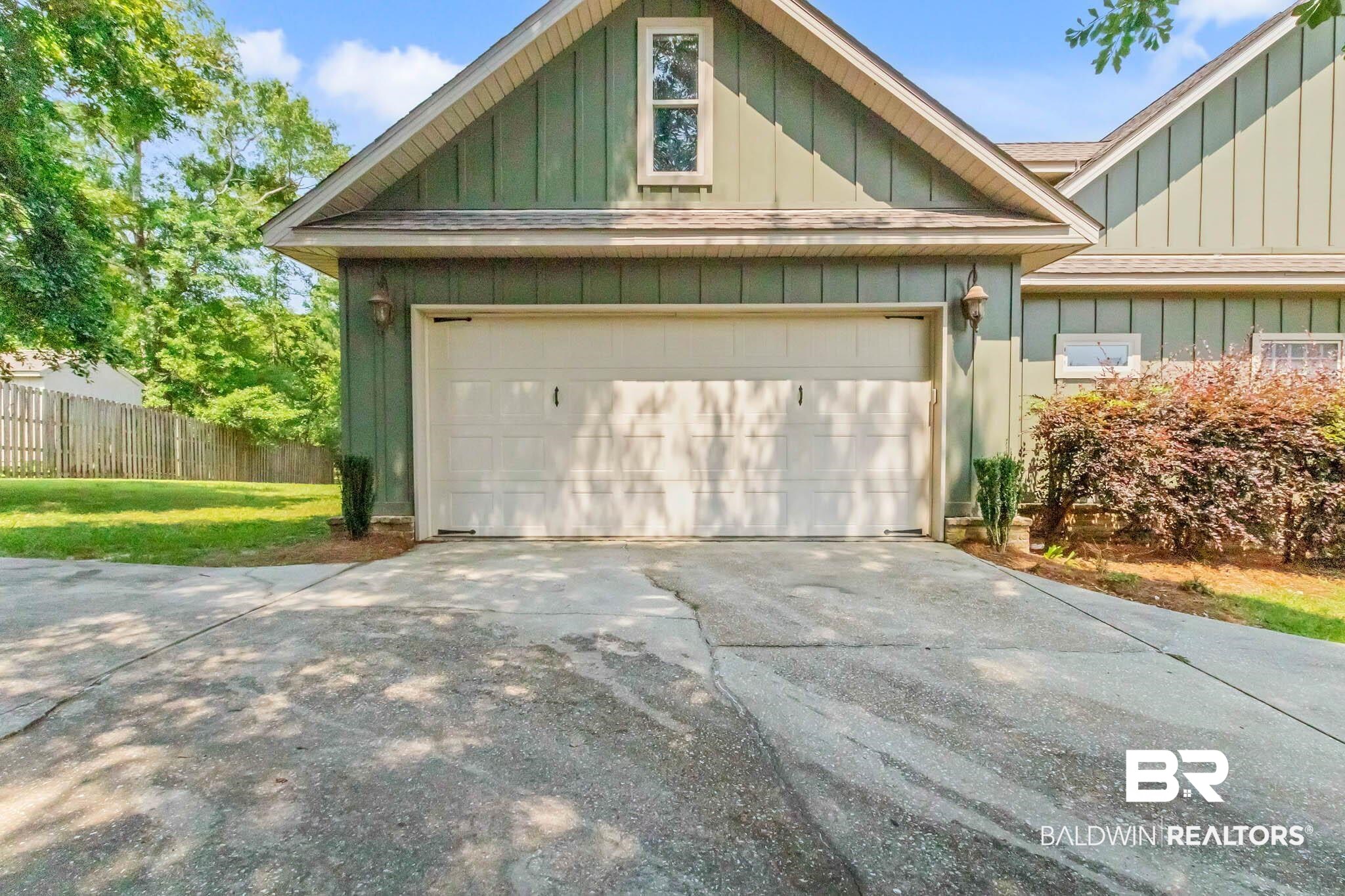 7854 Raegan Lane Daphne, AL 36527 - Photo 64 of 70 Garage with concrete driveway