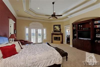 3402 Deep Waters Court Simi Valley, CA 93065 - Photo 15 of 48 a bedroom with a bed and a flat screen tv