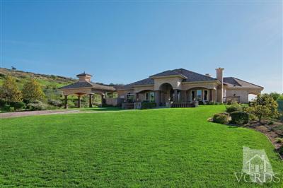 3402 Deep Waters Court Simi Valley, CA 93065 - Photo 3 of 48 a front view of a house with garden