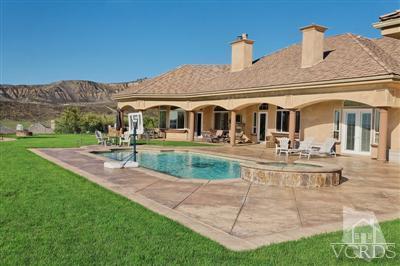 3402 Deep Waters Court Simi Valley, CA 93065 - Photo 27 of 48 a view of a white building with a yard
