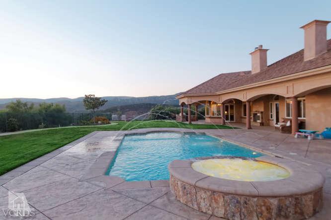3402 Deep Waters Court Simi Valley, CA 93065 - Photo 39 of 48 a view of a house with a swimming pool