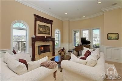 3402 Deep Waters Court Simi Valley, CA 93065 - Photo 6 of 48 a living room with furniture fireplace and a large window
