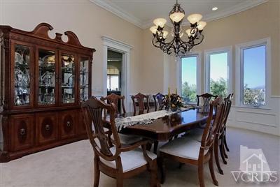 3402 Deep Waters Court Simi Valley, CA 93065 - Photo 7 of 48 a view of a dining room with furniture wooden floor and chandelier