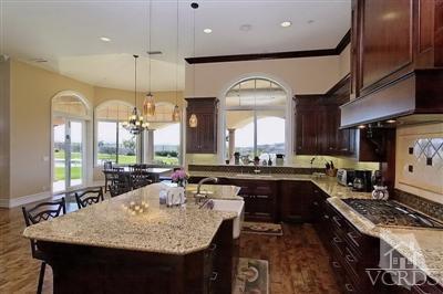 3402 Deep Waters Court Simi Valley, CA 93065 - Photo 9 of 48 a large kitchen with a large counter space a sink appliances and a large window