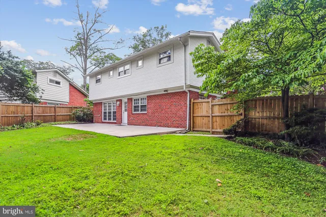 a view of a backyard with a small cabin