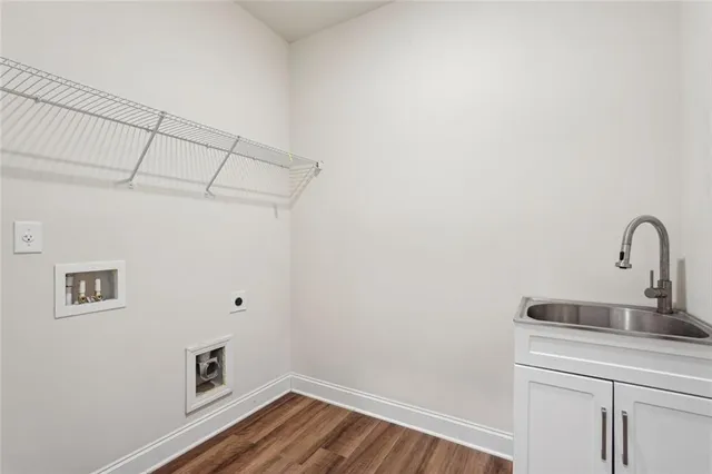 a bathroom with a sink a toilet and a bathtub