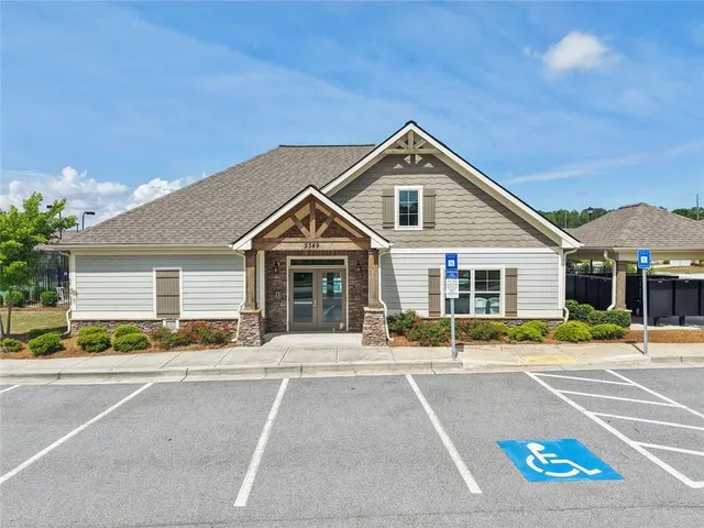 an aerial view of a house with outdoor space