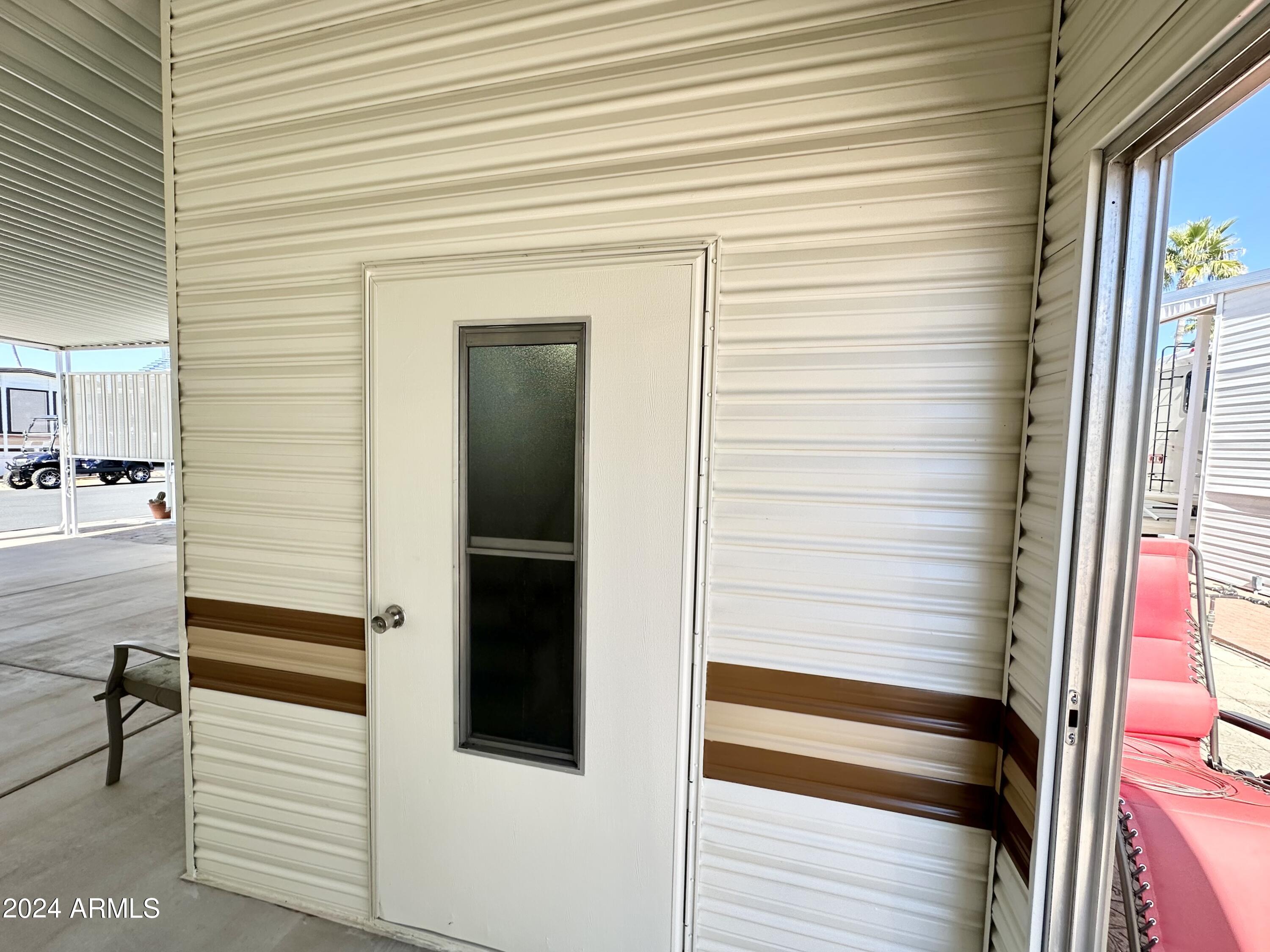 1007 South Prospectors Road Apache Junction, AZ 85119 - Photo 8 of 43 SHED DOOR