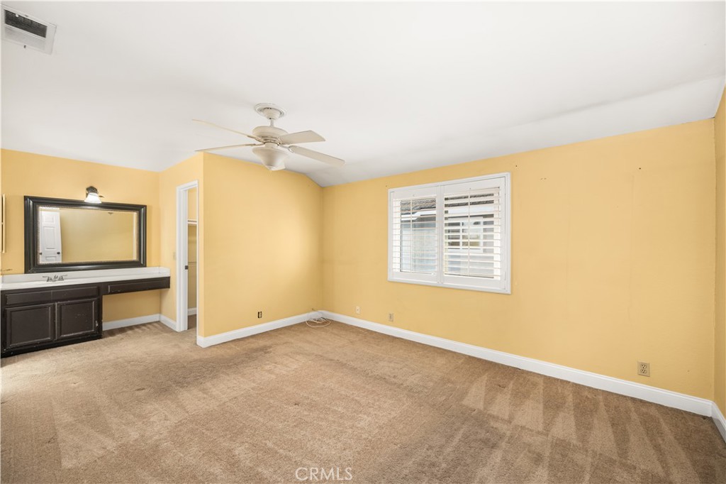 1062 Walnut Street, Unit C Tustin, CA 92780 - Photo 30 of 41 a view of an empty room with a window