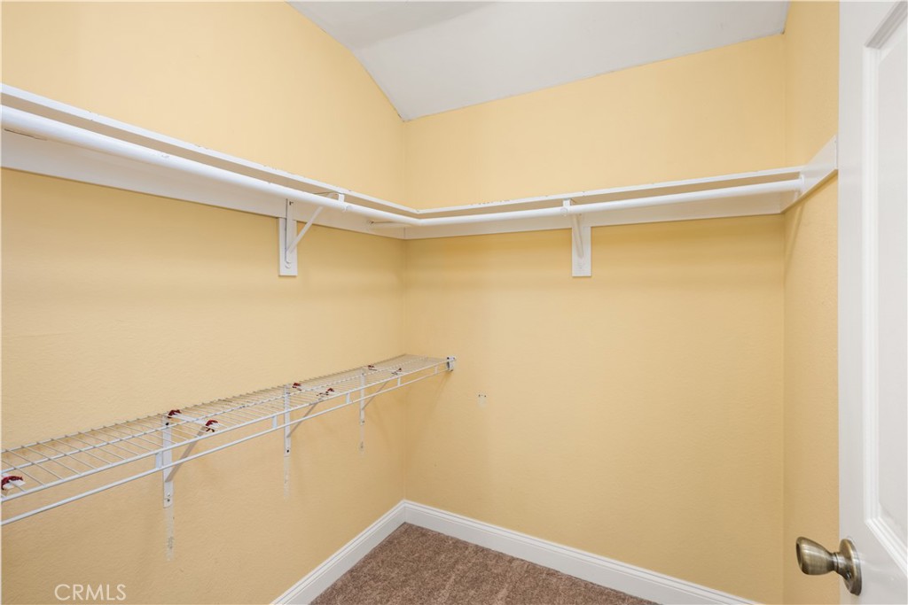 1062 Walnut Street, Unit C Tustin, CA 92780 - Photo 35 of 41 a view of a room with racks on the wall