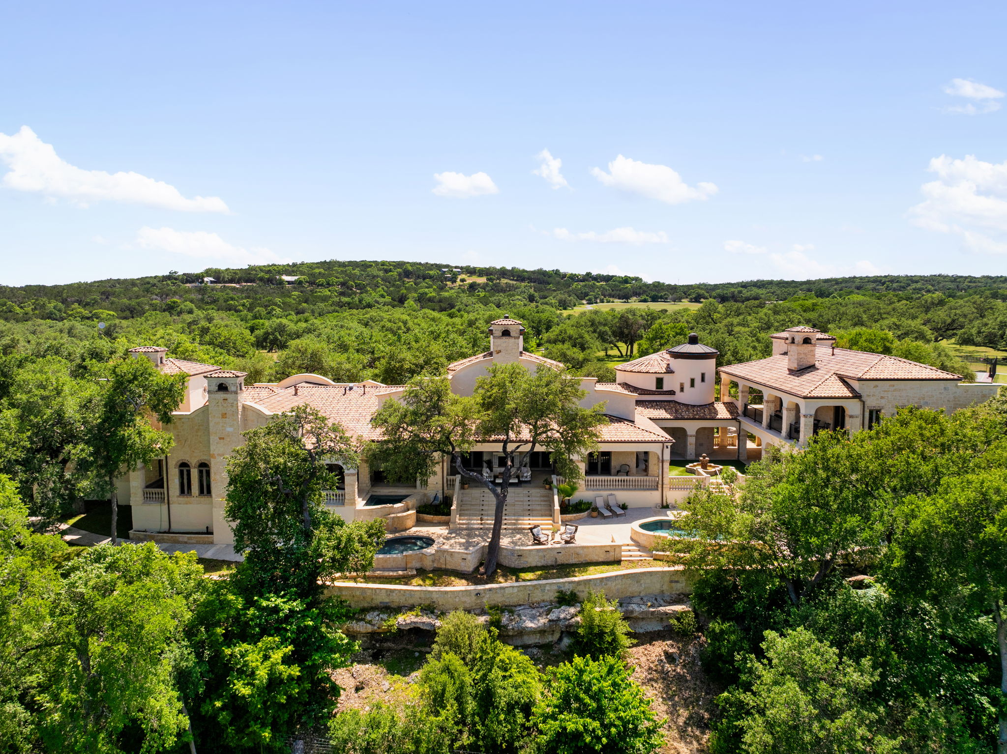 4256 Fischer Store Road Wimberley, TX 78676 - Photo 7 of 40 Drone / aerial view of a heavily wooded area