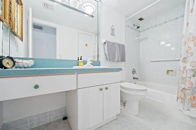 a view of a building with a yard