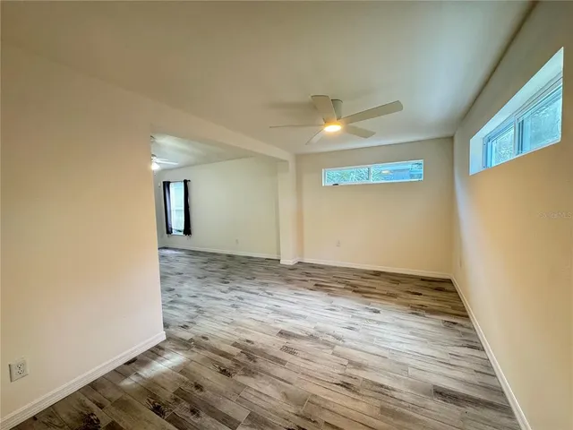 a view of an empty room and window