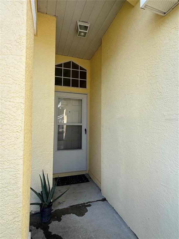 3350 Lake Tiny Circle Orlando, FL 32818 - Photo 3 of 27 a view of front door of house and yard