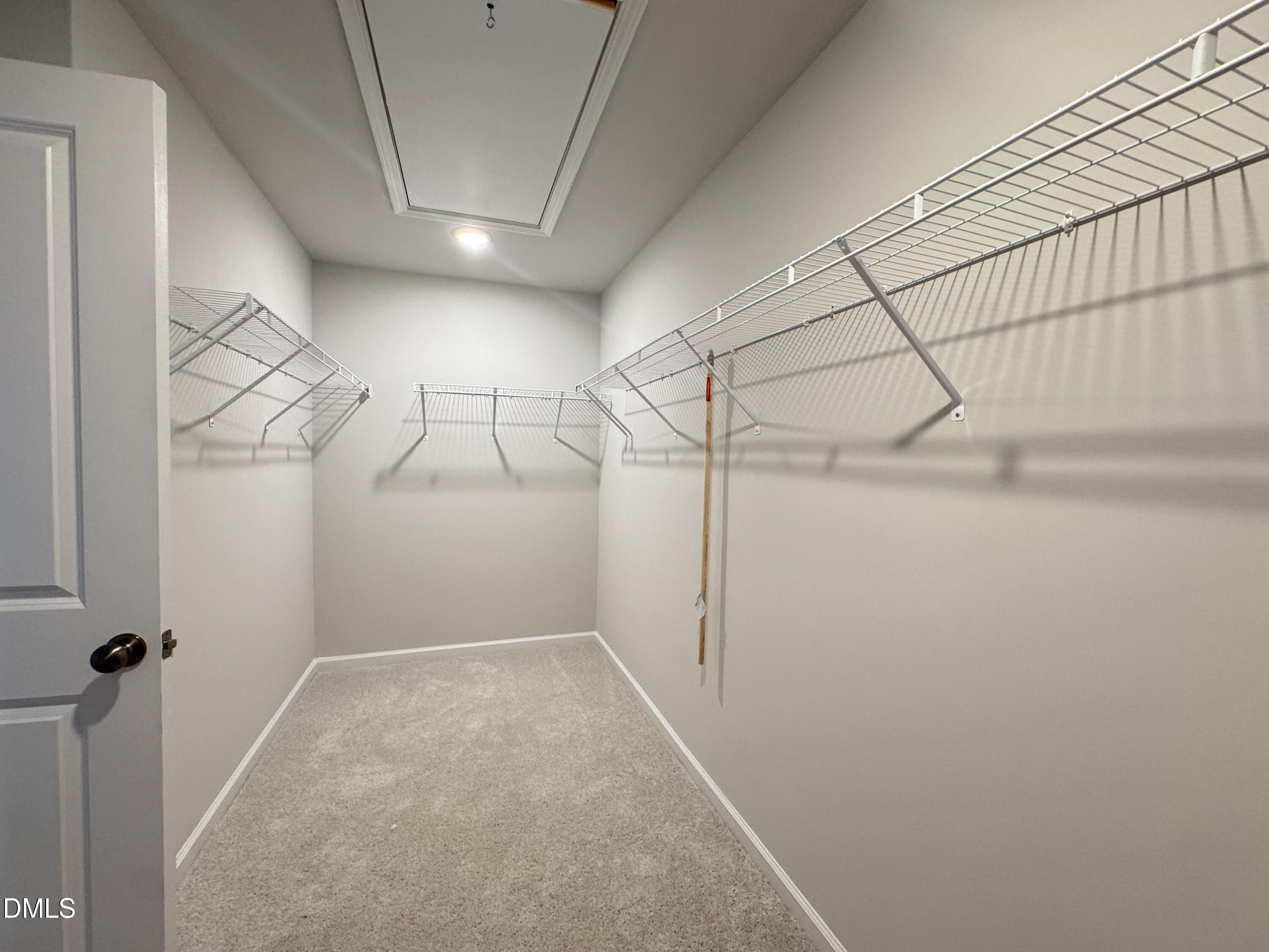 523 Hester Road Durham, NC 27703 - Photo 12 of 21 a view of a room with racks on the wall