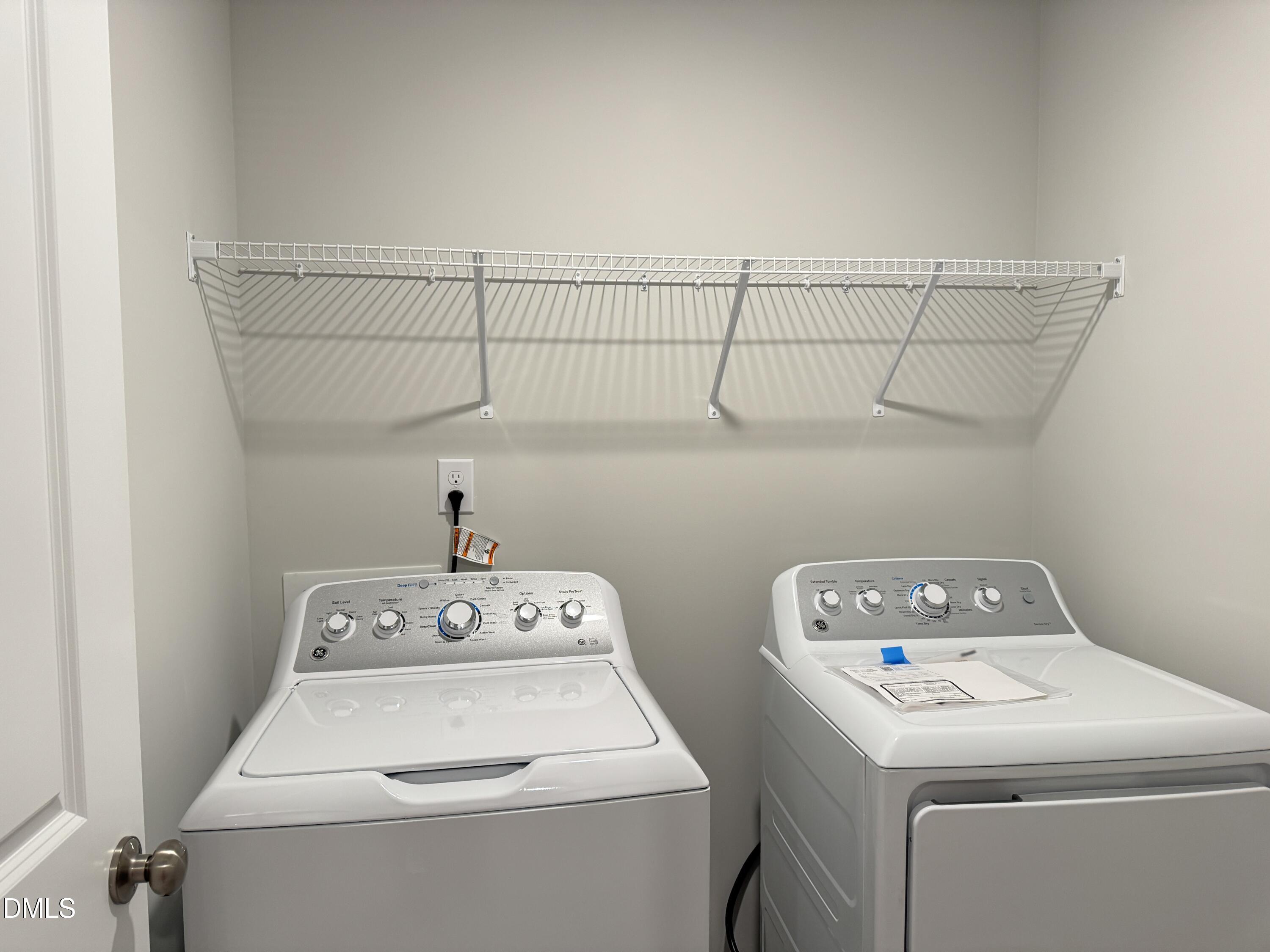 523 Hester Road Durham, NC 27703 - Photo 15 of 21 a utility room with dryer and washer