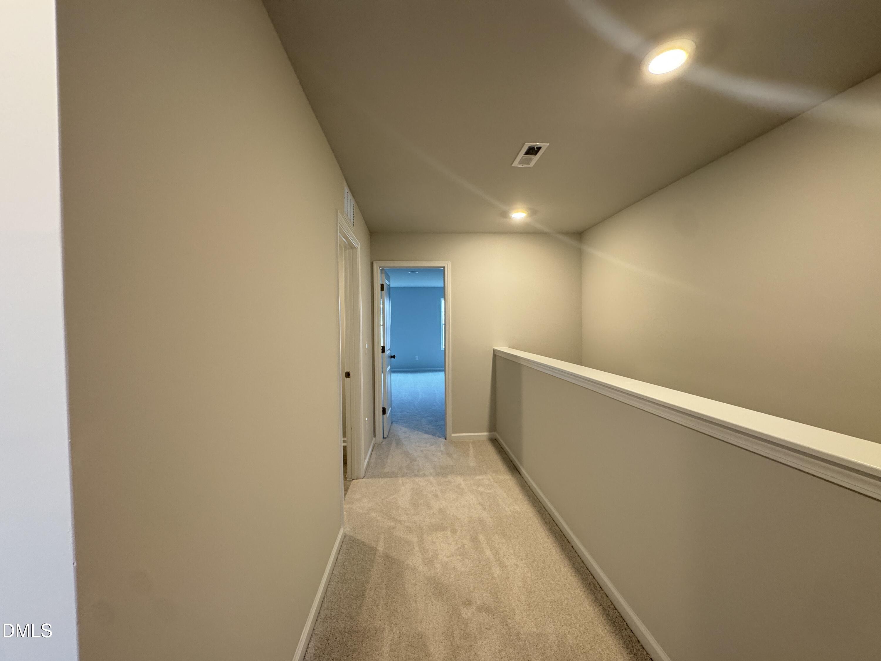 523 Hester Road Durham, NC 27703 - Photo 10 of 21 a view of hallway with stairs