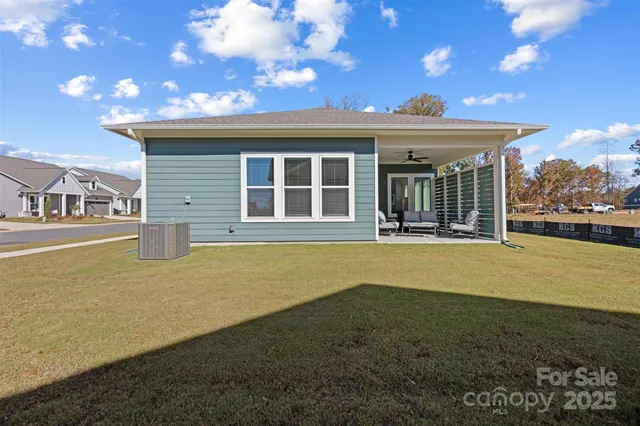 a view of a house with swimming pool