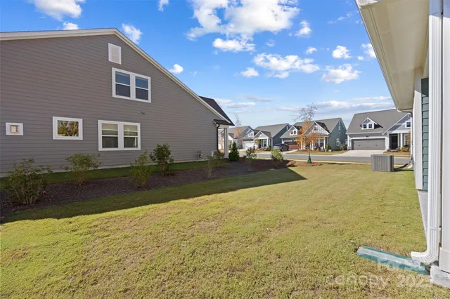 a view of outdoor space and front view of a house