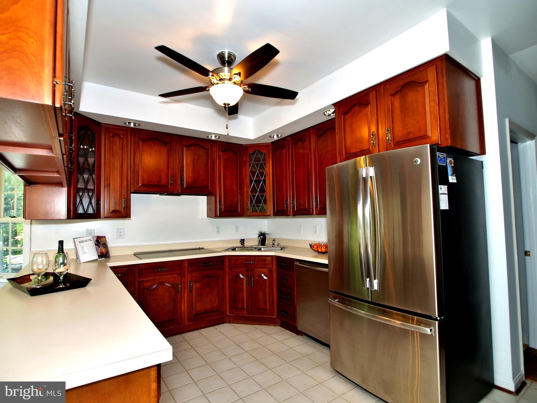 661 Bryants Nursery Road Silver Spring, MD 20905 - Photo 13 of 30 Cherry cabinets and all stainless steel appliances