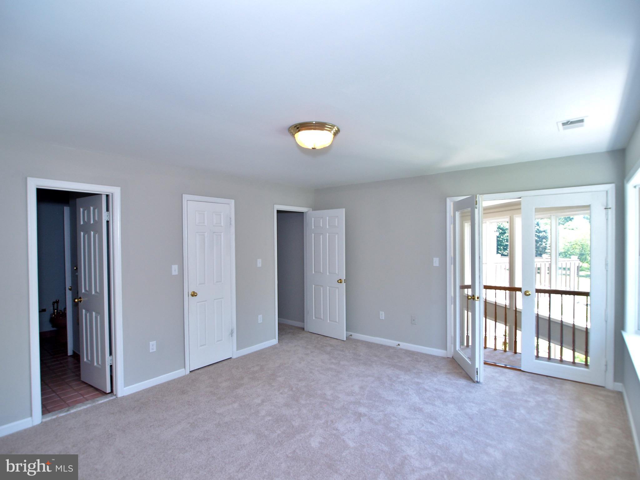 661 Bryants Nursery Road Silver Spring, MD 20905 - Photo 21 of 30 3rd BR with eyebrow balcony and walk-in closet