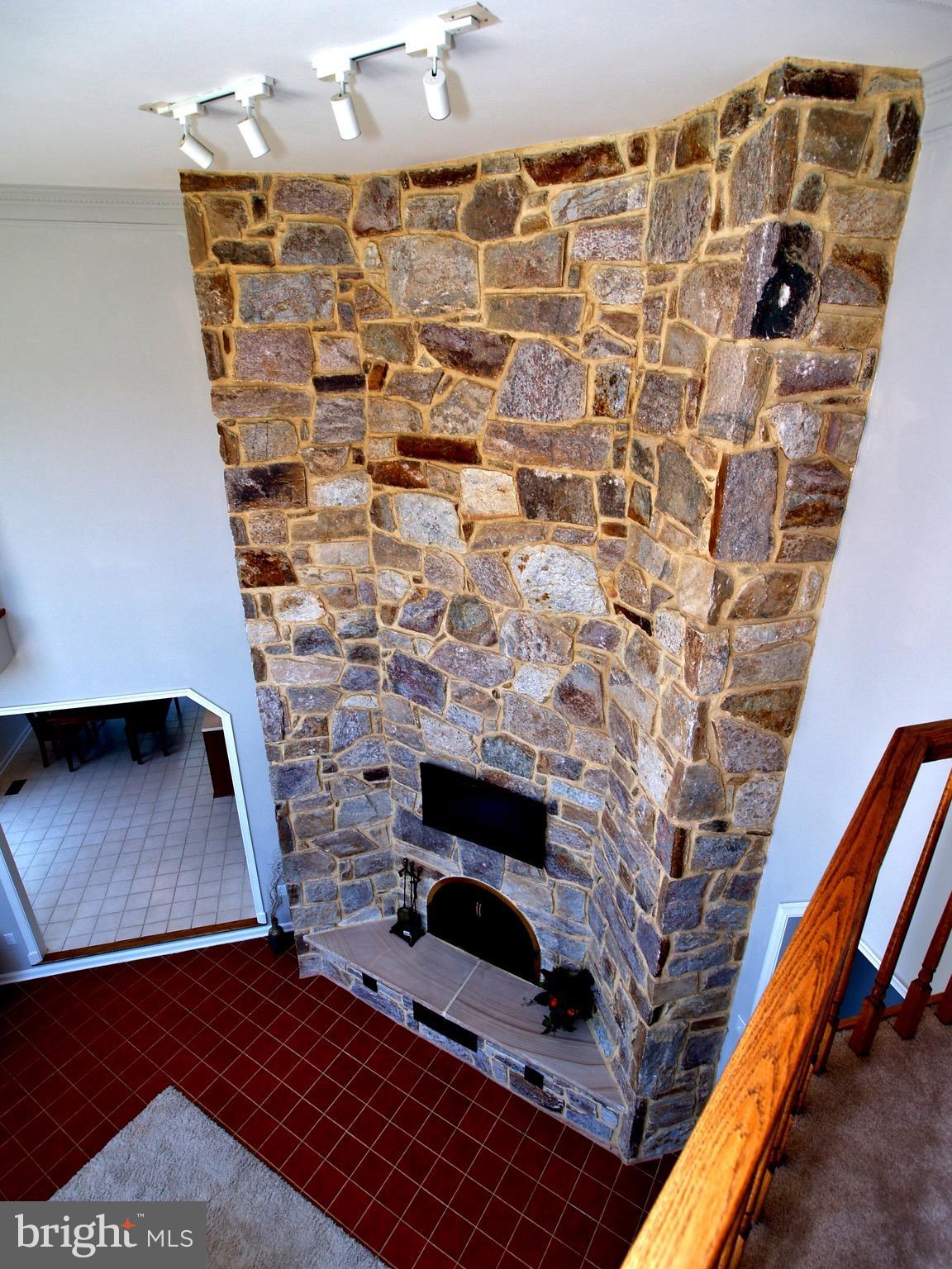 661 Bryants Nursery Road Silver Spring, MD 20905 - Photo 9 of 30 Impressive stone two-story wood burning fireplace