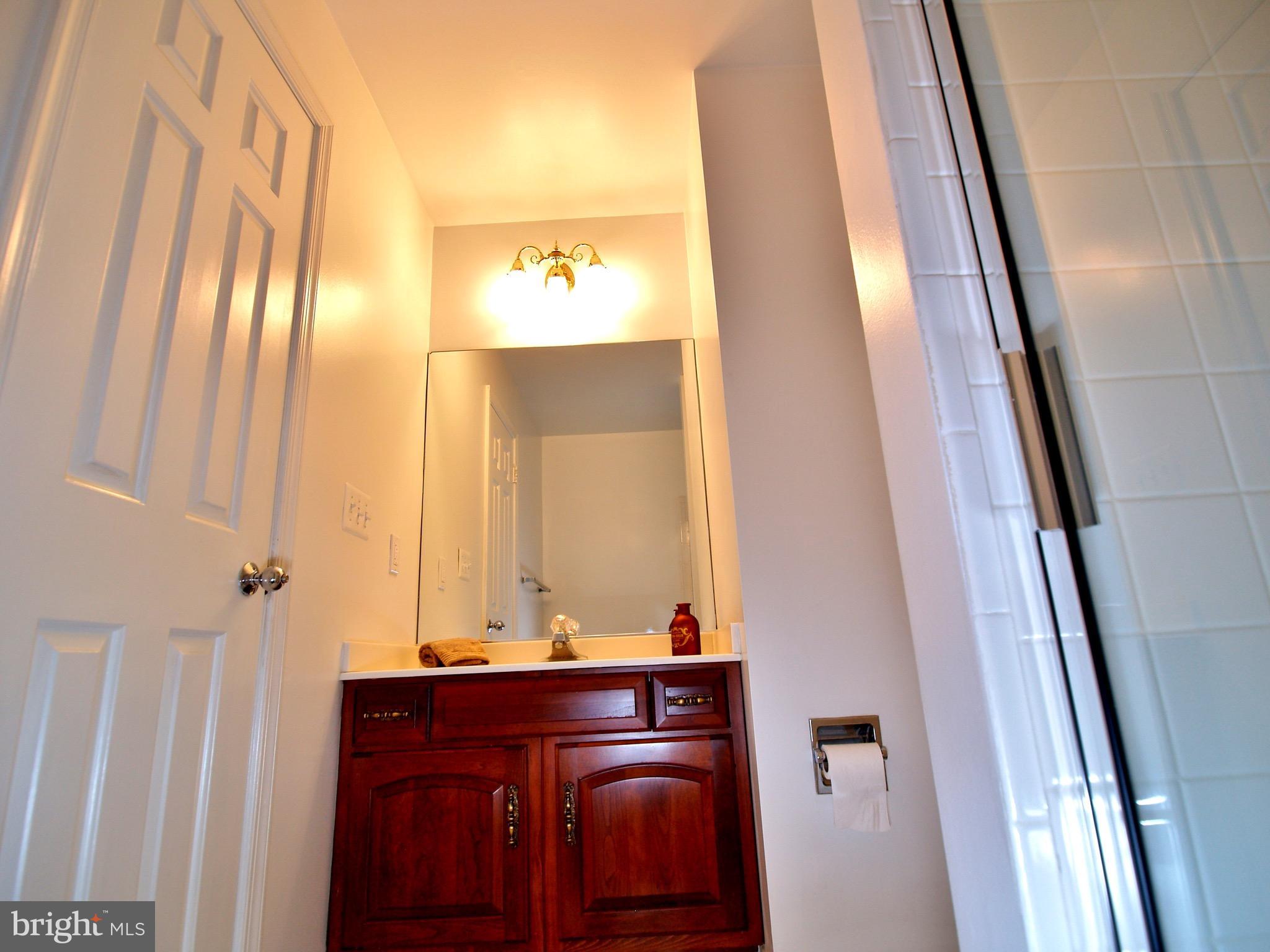 661 Bryants Nursery Road Silver Spring, MD 20905 - Photo 10 of 30 Main floor bath also offers glass door shower